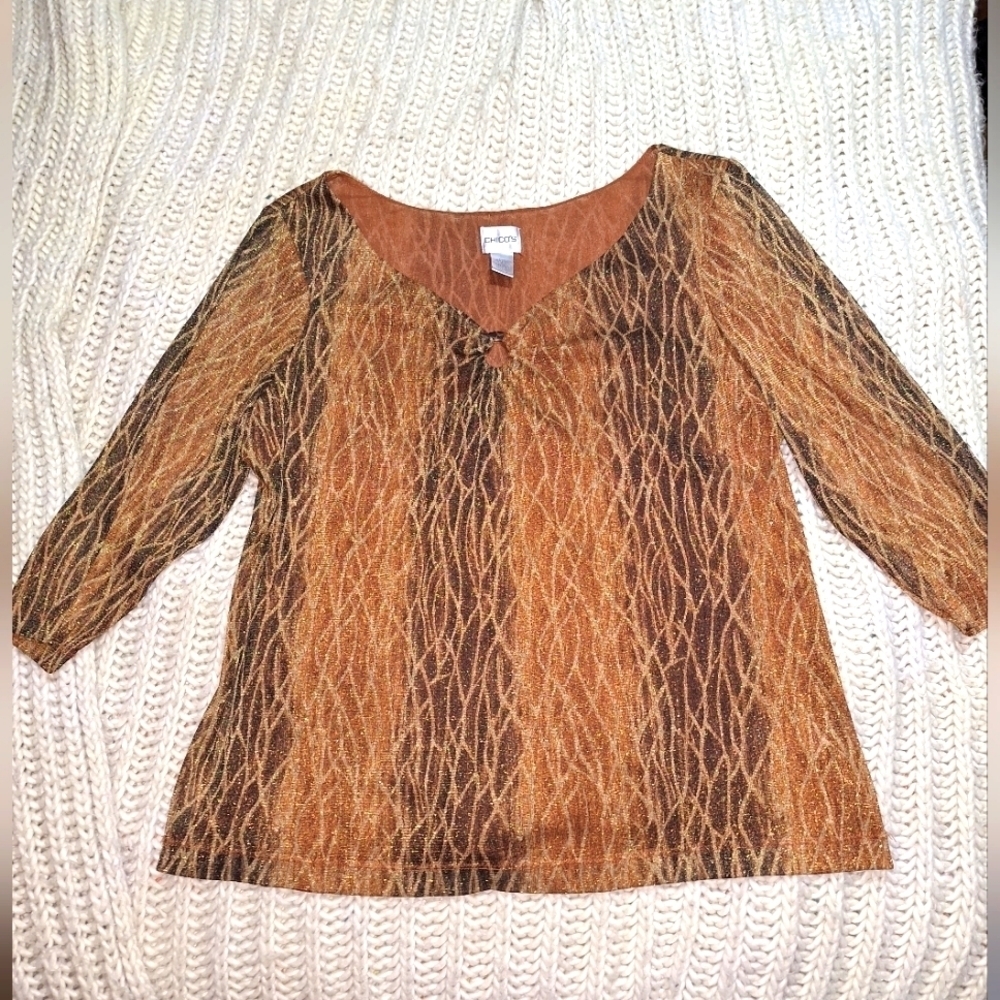 A Chicos gold and brown metallic sheer tunic top in a size Small.